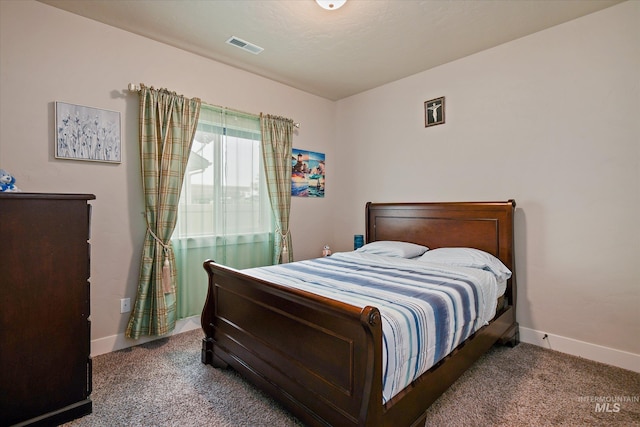 11771 W Cross Slope Way, Nampa, ID 83686 - bedroom with baseboards, visible vents, and carpet flooring