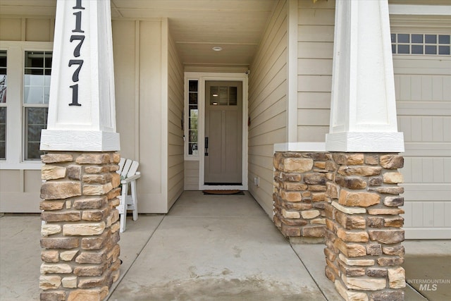 11771 W Cross Slope Way, Nampa, ID 83686 - doorway to property with stone siding