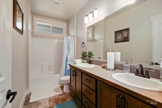 11771 W Cross Slope Way, Nampa, ID 83686 - full bath featuring a sink, toilet, visible vents, and double vanity