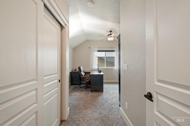11771 W Cross Slope Way, Nampa, ID 83686 - home office featuring baseboards, a ceiling fan, light colored carpet, and vaulted ceiling