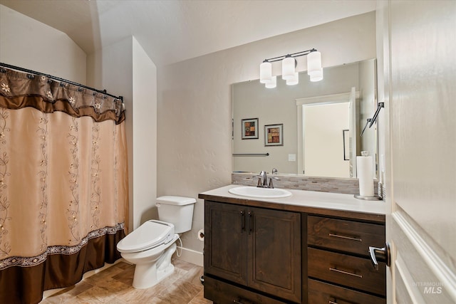 11771 W Cross Slope Way, Nampa, ID 83686 - bathroom featuring vanity, toilet, and a shower with curtain