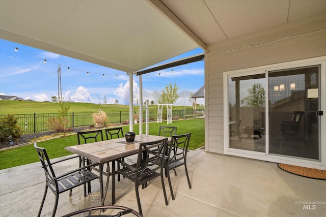 11771 W Cross Slope Way, Nampa, ID 83686 - view of patio with outdoor dining area and a fenced backyard