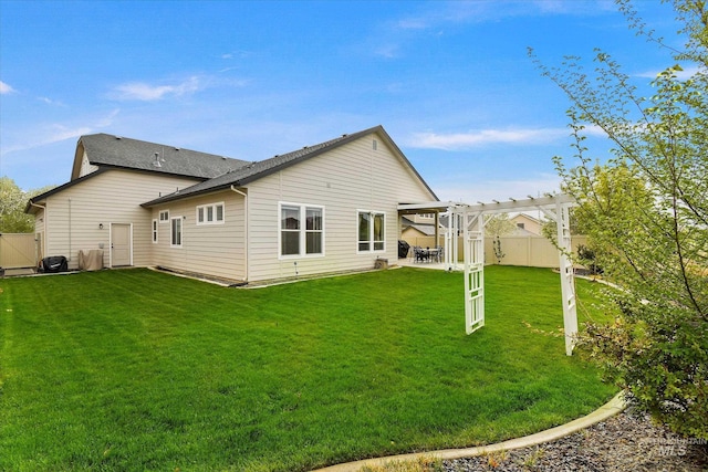 11771 W Cross Slope Way, Nampa, ID 83686 - rear view of property with a patio area, a shingled roof, a pergola, a yard, and a fenced backyard