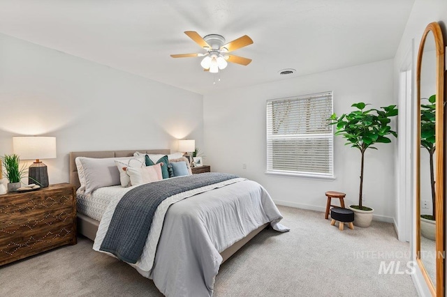 178 W Lava Falls Dr, Meridian, ID 83646 - carpeted bedroom with baseboards and a ceiling fan
