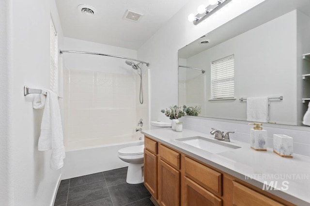 full bathroom with bathtub / shower combination, vanity, toilet, and tile patterned flooring