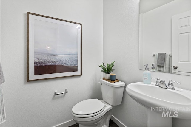 178 W Lava Falls Dr, Meridian, ID 83646 - bathroom with baseboards and toilet