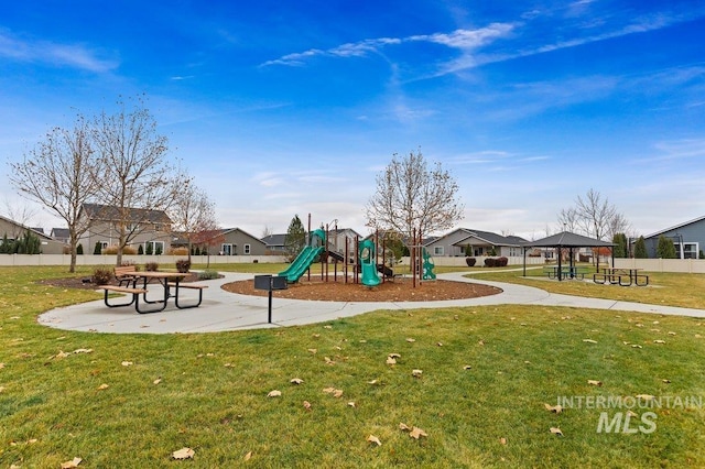 view of jungle gym featuring a yard and a gazebo