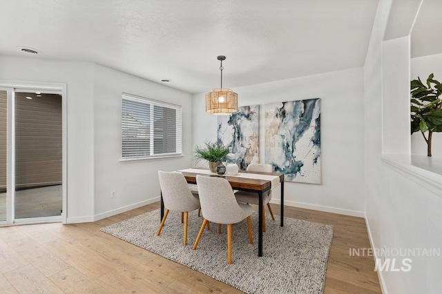 178 W Lava Falls Dr, Meridian, ID 83646 - dining space with wood finished floors