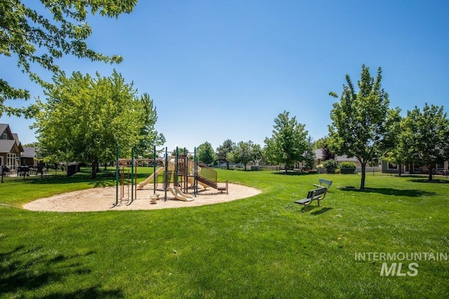 view of play area featuring a lawn