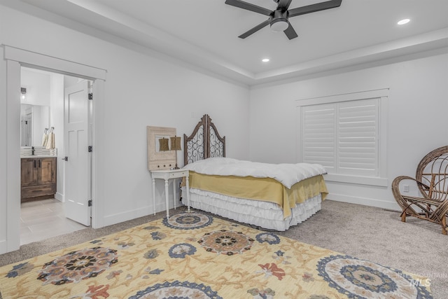 bedroom with recessed lighting, carpet, baseboards, a ceiling fan, and a raised ceiling