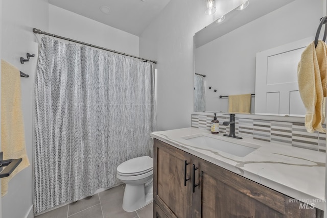 full bath featuring backsplash, toilet, tile patterned floors, vanity, and a shower with shower curtain