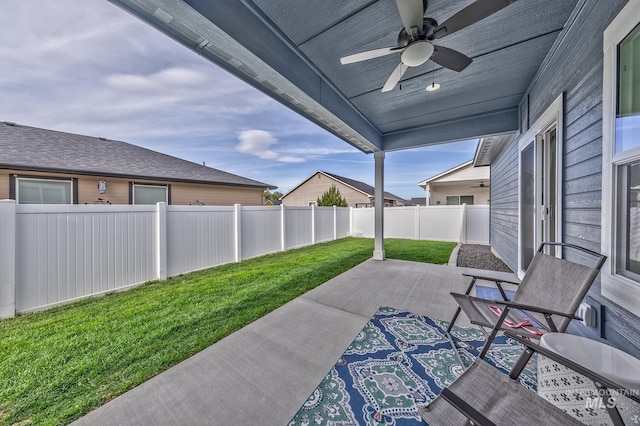 view of patio featuring a ceiling fan