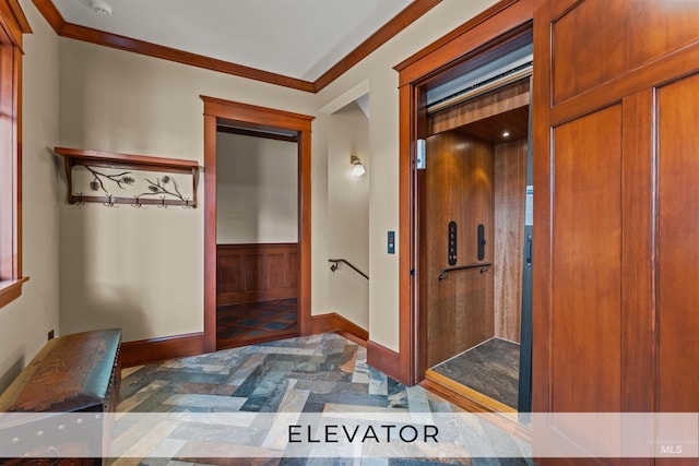 hallway with elevator and ornamental molding