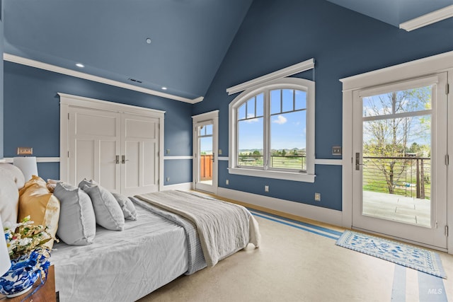 bedroom with access to exterior, lofted ceiling, and ornamental molding