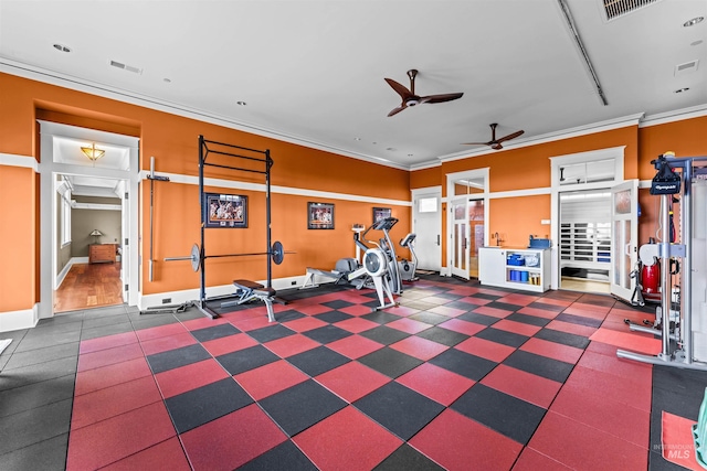 workout area with ceiling fan and ornamental molding