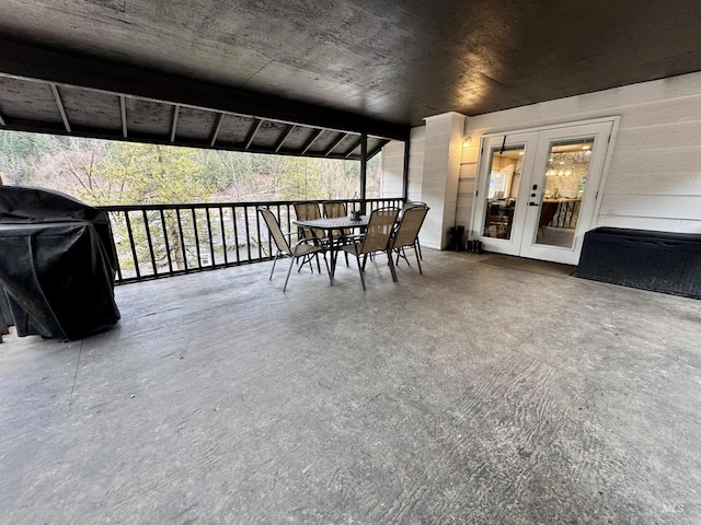 view of patio / terrace featuring outdoor dining space, french doors, and area for grilling