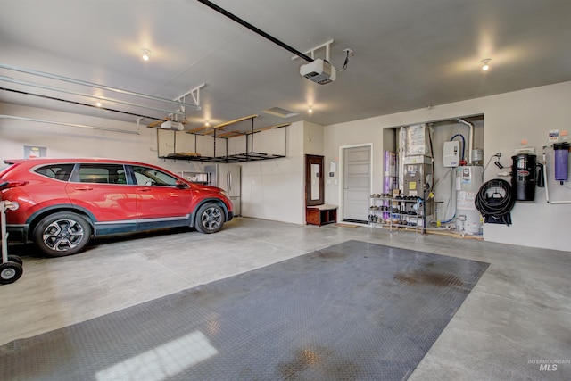 garage featuring a garage door opener and gas water heater