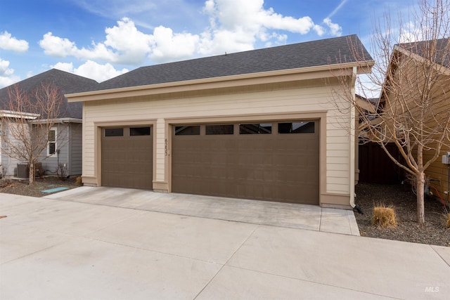 exterior space with concrete driveway