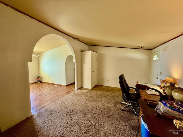 103 Beech St, Nezperce, ID 83543 - carpeted home office featuring crown molding and arched walkways