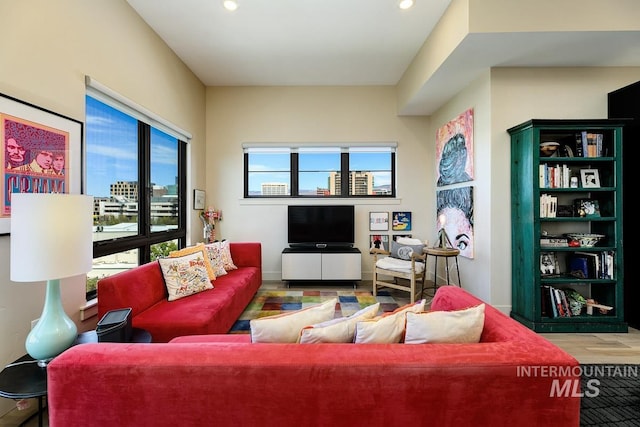 880 W River St, Boise, ID 83702 - living room with recessed lighting, a wealth of natural light, and wood finished floors