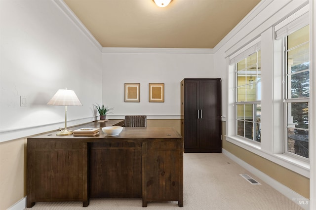 carpeted office with ornamental molding