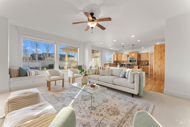 living room with ceiling fan