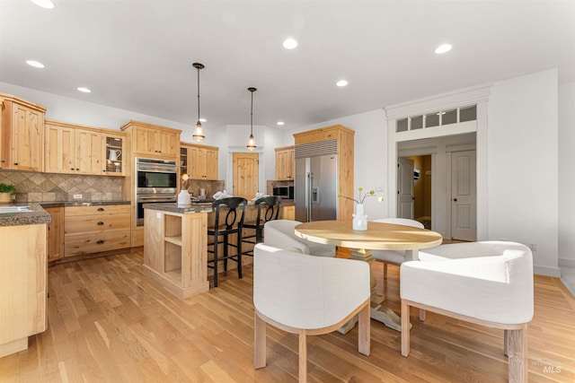 dining room featuring light wood-type flooring