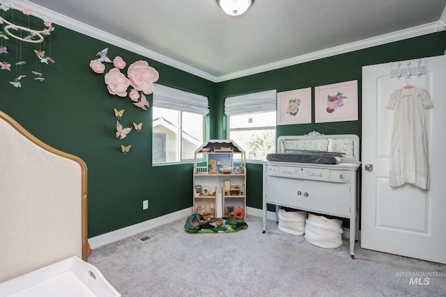 bedroom featuring ornamental molding, carpet flooring, and baseboards