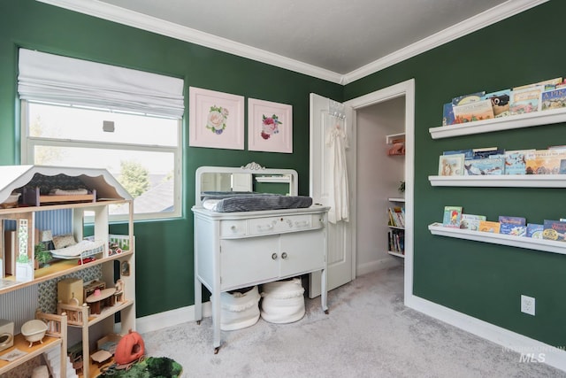 rec room with crown molding, carpet flooring, and baseboards