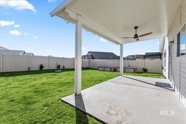 view of patio / terrace featuring ceiling fan