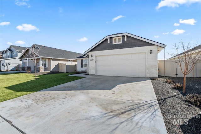 single story home with a garage and a front yard