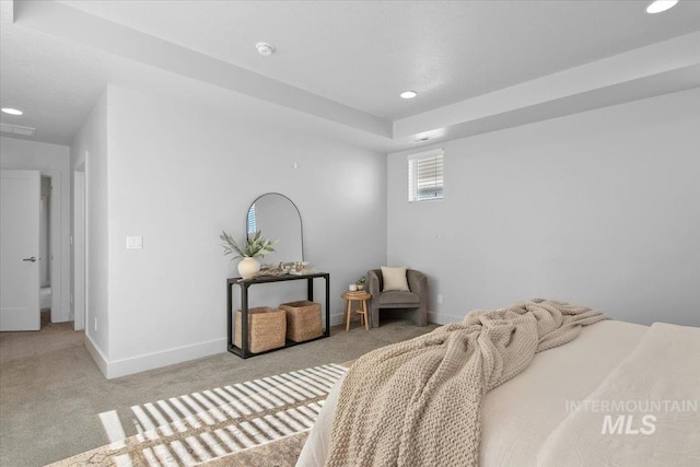 bedroom with visible vents, recessed lighting, light colored carpet, and baseboards