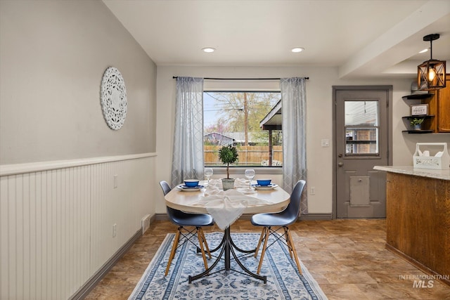 dining space with baseboards, recessed lighting, and visible vents