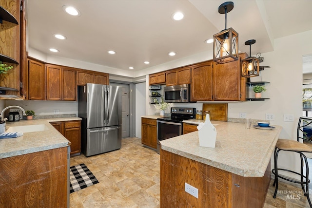 kitchen featuring open shelves, a peninsula, light countertops, a sink, and stainless steel appliances