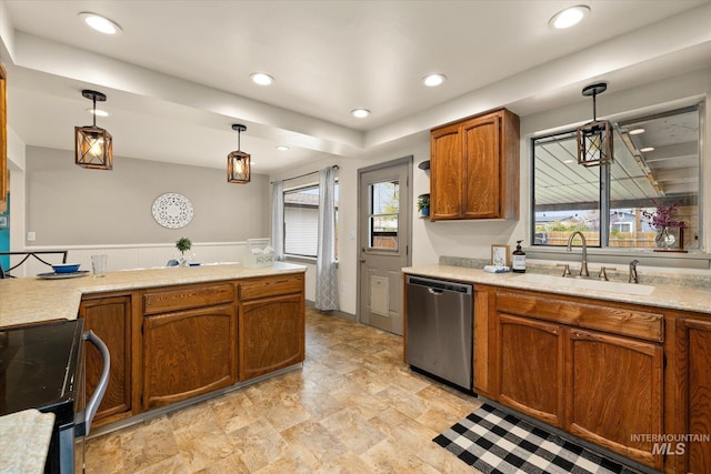 kitchen featuring stainless steel dishwasher, brown cabinetry, pendant lighting, light countertops, and a sink