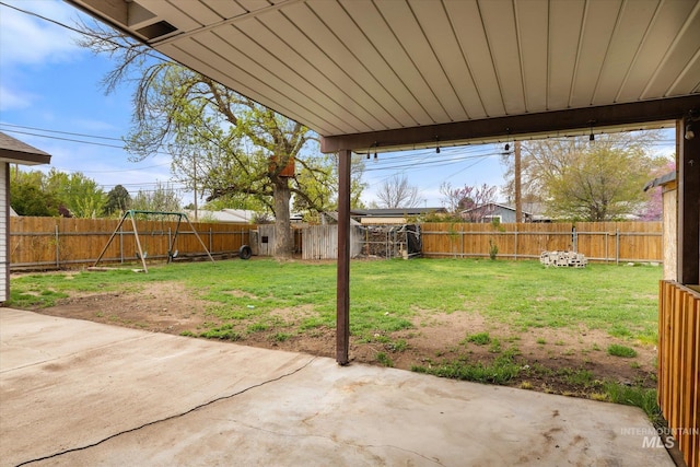view of yard with a fenced backyard and a patio area