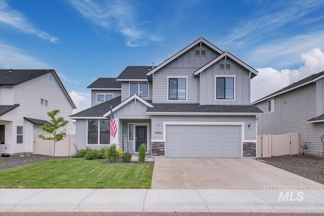 5094 W Avilla Dr, Meridian, ID 83646 - craftsman house with board and batten siding, driveway, an attached garage, and stone siding