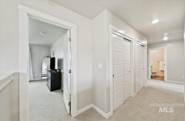 5094 W Avilla Dr, Meridian, ID 83646 - corridor featuring light colored carpet and baseboards