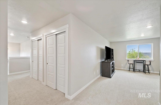 5094 W Avilla Dr, Meridian, ID 83646 - interior space with carpet flooring, baseboards, a textured ceiling, and recessed lighting