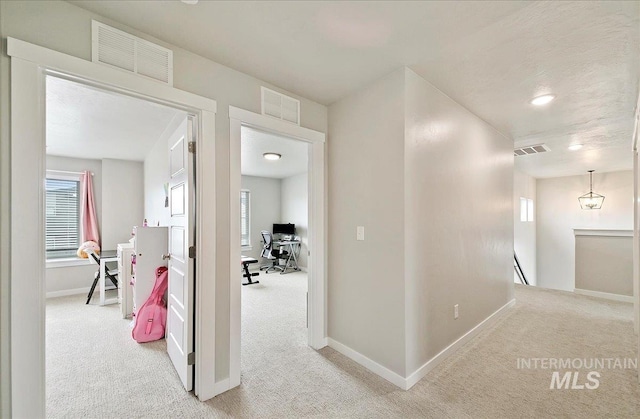 5094 W Avilla Dr, Meridian, ID 83646 - corridor with an upstairs landing, carpet floors, an office area, healthy amount of natural light, and recessed lighting