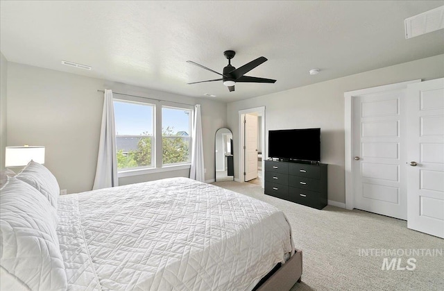5094 W Avilla Dr, Meridian, ID 83646 - bedroom with light colored carpet, baseboards, and a ceiling fan
