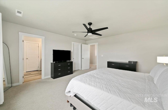 5094 W Avilla Dr, Meridian, ID 83646 - bedroom featuring light carpet, baseboards, and ceiling fan