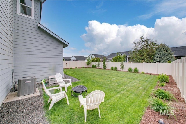 5094 W Avilla Dr, Meridian, ID 83646 - view of yard featuring cooling unit and an outdoor fire pit