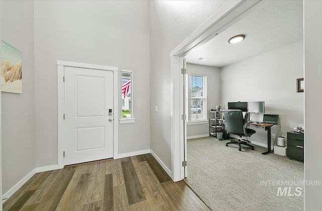 5094 W Avilla Dr, Meridian, ID 83646 - foyer with wood finished floors and baseboards