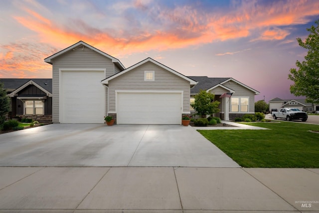 1071 W Rose Quartz St, Kuna, ID 83634 - view of front of home featuring a garage, a front lawn, and concrete driveway