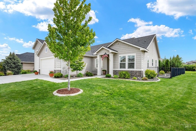 1071 W Rose Quartz St, Kuna, ID 83634 - view of front of property featuring stone siding, driveway, a garage, and a shingled roof