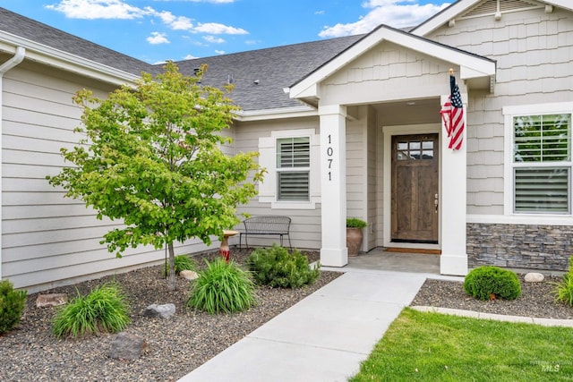 1071 W Rose Quartz St, Kuna, ID 83634 - entrance to property with roof with shingles and stone siding
