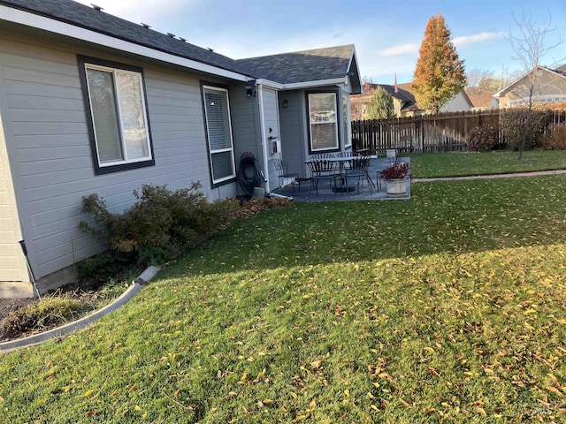 view of yard with a patio area and fence