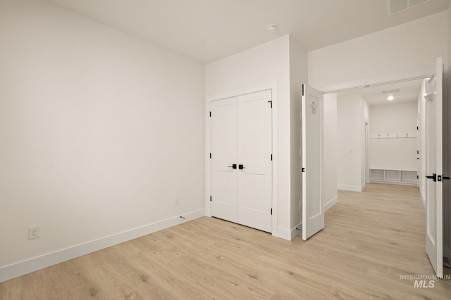 1724 Black Elm, Star, ID 83669 - unfurnished bedroom with light wood finished floors and a closet