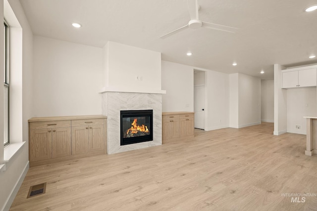 1724 Black Elm, Star, ID 83669 - unfurnished living room featuring a fireplace, a ceiling fan, recessed lighting, and light wood-type flooring